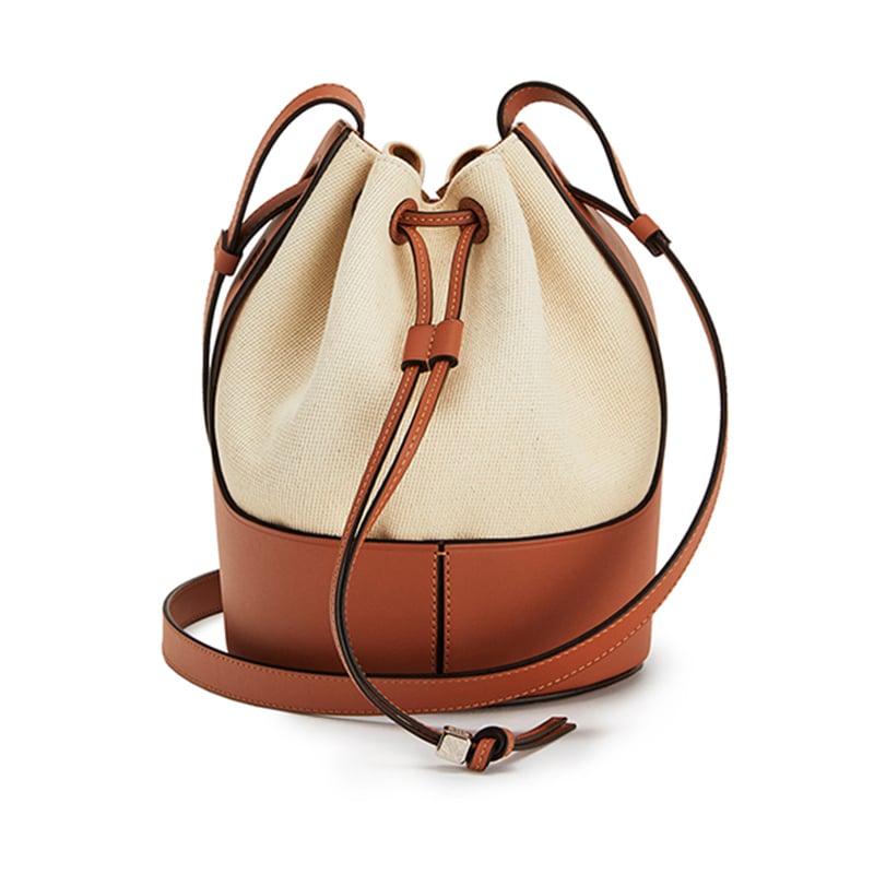 Shop LOEWE Drawstring bucket bag in palm leaf and calfskin