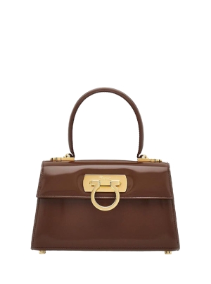 Iconic top handle