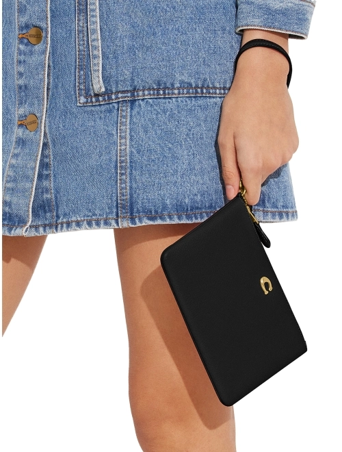 Small flavourfull wristlet coach